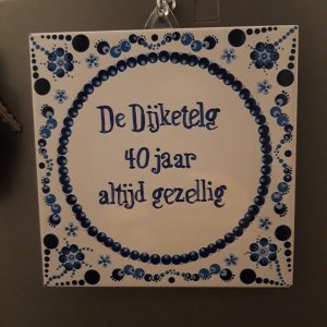 Uniek gestipt wandtegel met spreuk