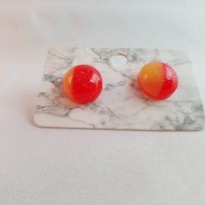 Rode oranje glitter oorknoppen