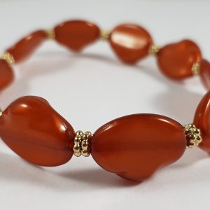 Bruin rood en goud kralen rek armband