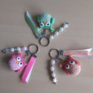 Uiltjes sleutelhanger met lint, kralen en bedeltje