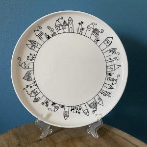 Bord met huisjes/katjes