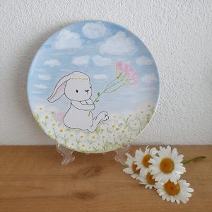 Konijn in madeliefjes