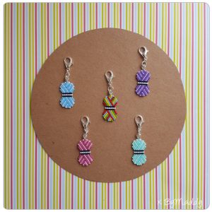 Steekmarkeerders, progresskeepers, charms